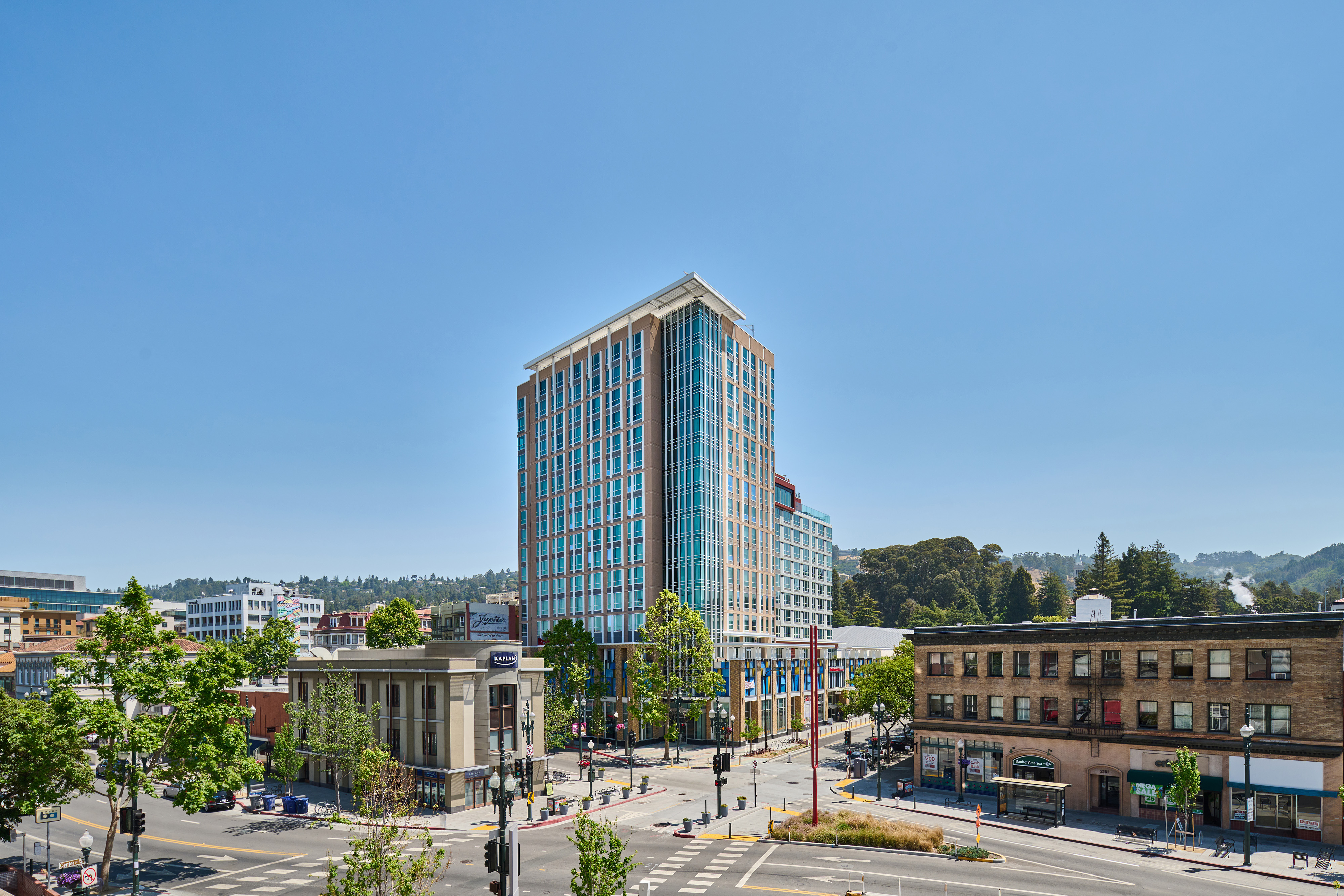 Aerial view of Residence Inn by Marriott Berkeley with downtown Berkeley and the hills in the background